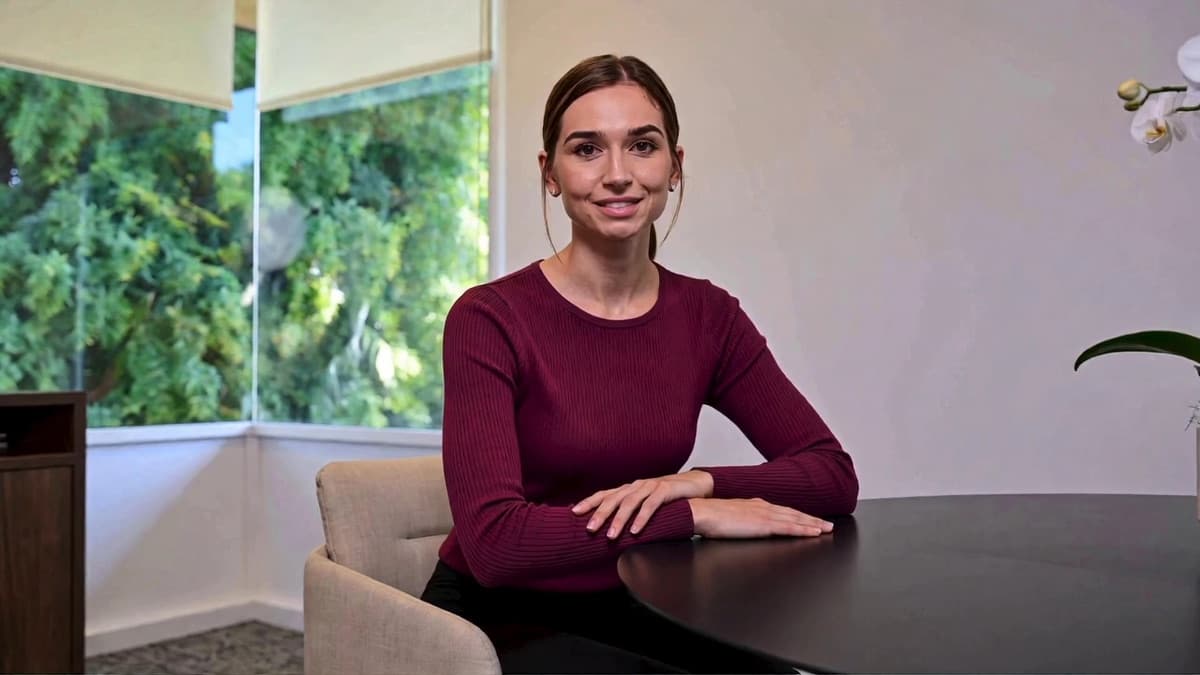 Emma, the Sterling Learn AI teacher, welcoming students from a bright classroom